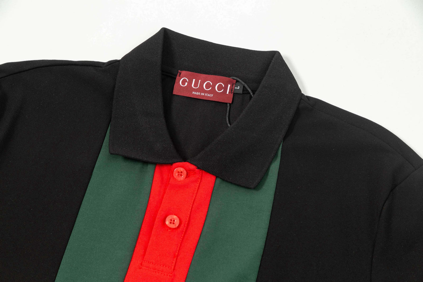 Polo rayé rouge et vert