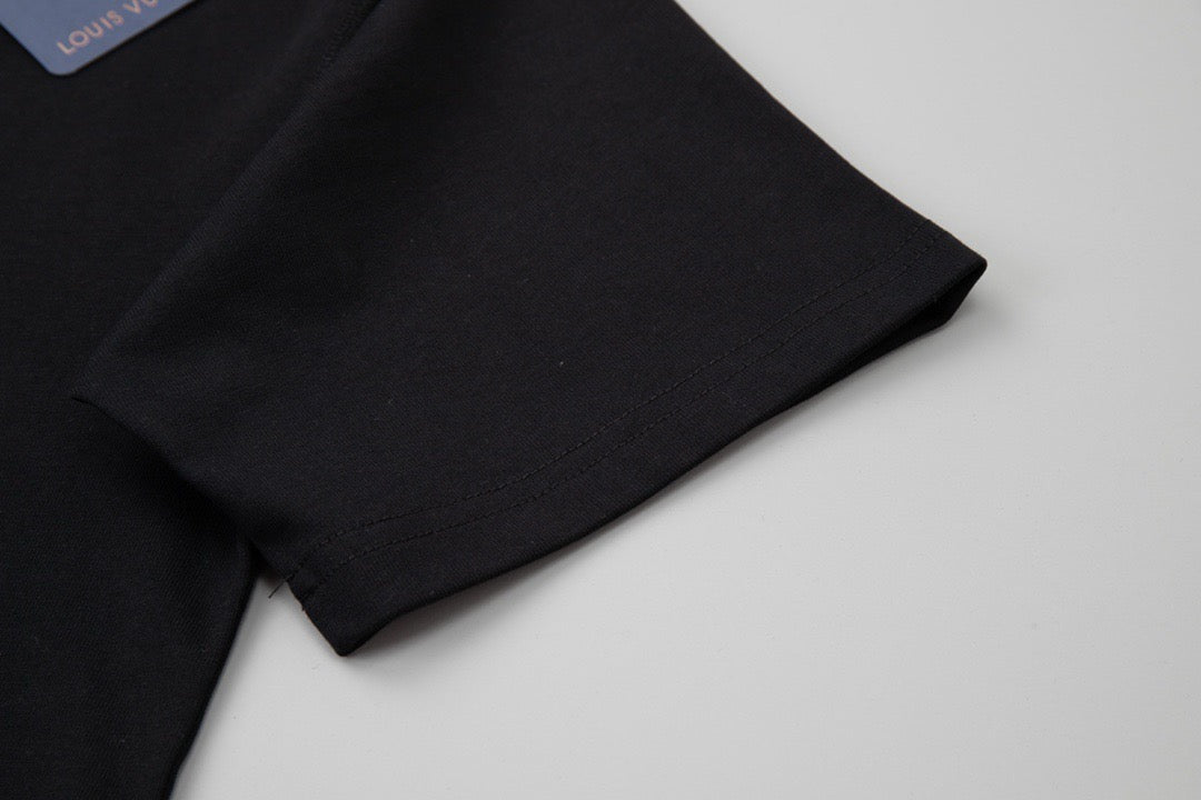 T-shirt imprimé à pompons colorés