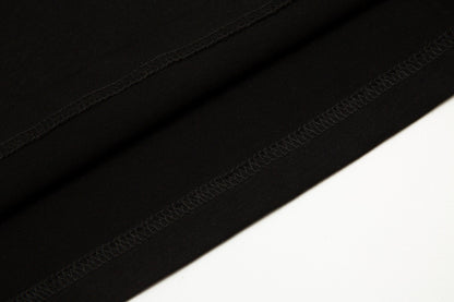 T-Shirt mit fliegendem Haus-Print