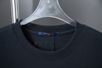 T-shirt patchwork en jean brodé