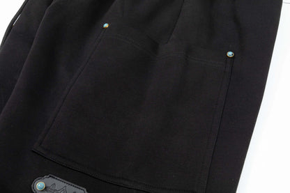 Türkisfarbene Shorts mit Schnallenakzent
