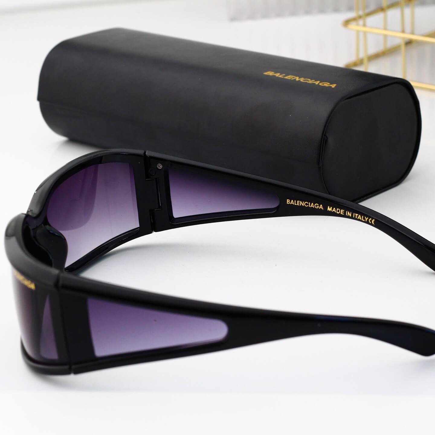 Lunettes de soleil incurvées à monture intégrale futuriste