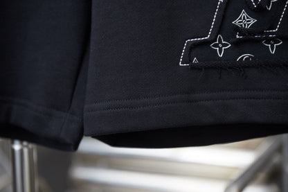 Shorts mit Blütenblatt-Applikation