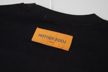 T-shirt imprimé à pompons colorés