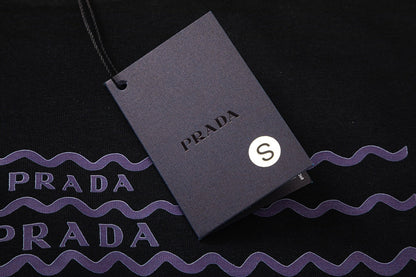T-shirt à imprimé triangle ondulé